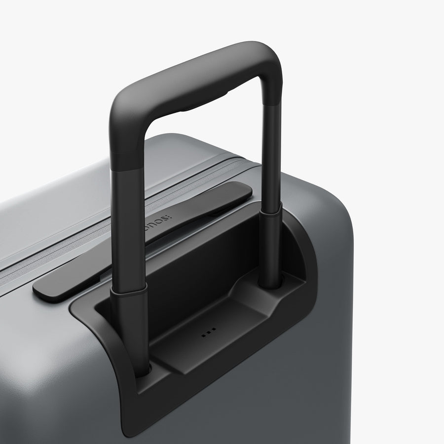 Storm Grey | Extended luggage handle view of Carry-On in Storm Grey